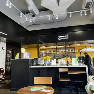 a restaurant with tables and chairs