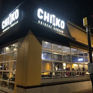 At corner of streets