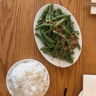 Specialty: String Bean Salad paired with White Rice. Topped with garlic, red chili vinaigrette.. Vegetarian/vegan and gluten-free!