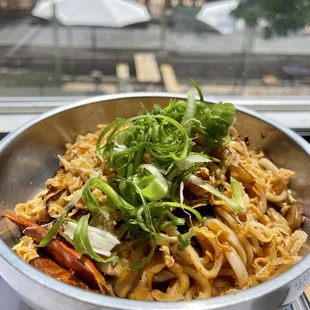 People watching as I enjoy my Lamb Noodles