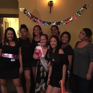 a group of women posing for a picture