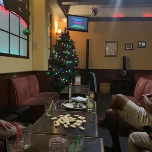 a group of people sitting around a table