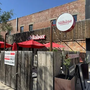 Entrance and outdoor seating.
