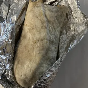 a burrito wrapped in foil