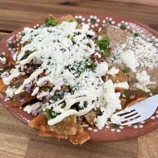Chilaquiles with red and green sauce.