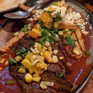 Grilled Skirt Steak, Guajillo, Loaded Sweet Potato Fries, Black Pepper Mayo, Grilled Corn, Queso Fresco