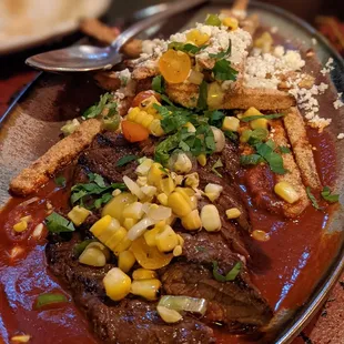 Grilled Skirt Steak, Guajillo, Loaded Sweet Potato Fries, Black Pepper Mayo, Grilled Corn, Queso Fresco