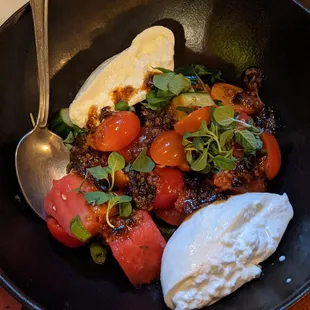 Heirloom tomatoes, burrata, watermelon, cucumber, salsa matcha, peanut