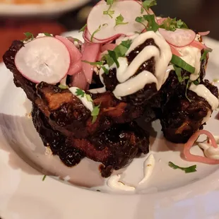 Grilled Pork Ribs, Honey-Pasilla Sauce, Radishes, Crema And Queso Fresco