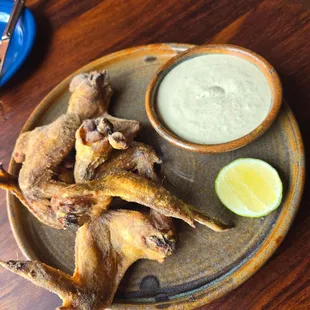 Wings and spicy green sauce
