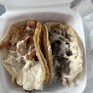 Chicken and steak taco with cheese and sour cream. Packed with meat and flavor!