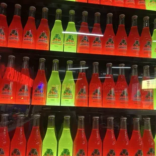 Close up of the Jarritos tacos sign