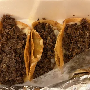 a close up of the tacos