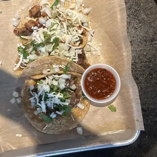 Barbacoa and pastor on tortillas