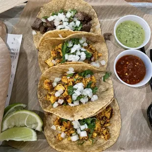 Three chicken tacos and a steak taco.