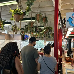 Line to order as soon as you walk in. Staff greeted everyone as they came in. Menus avail. giving people time to look over the menu.