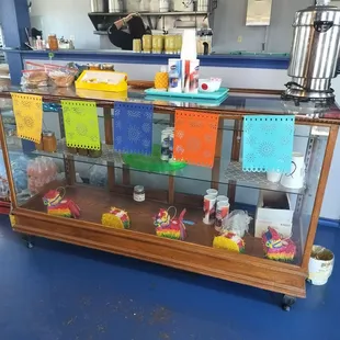 Extras like candy and hot sauces for sale.