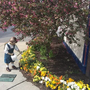 Statue on the west side of the building