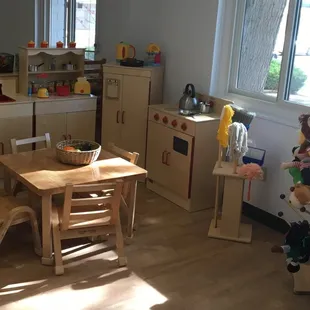 The Imaginarium is part dramatic play and part fine motor skill development. It features a stage, costumes, and building materials.