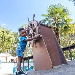 Ahoy! The Jolly Roger Pirate Ship from J.M. Barrie&apos;s Peter Pan beckons the adventurous little ones into the crow&apos;s nest above!