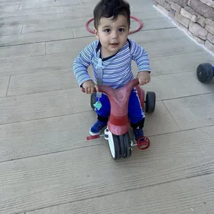 Riding my bike on the playground at children's learning adventure