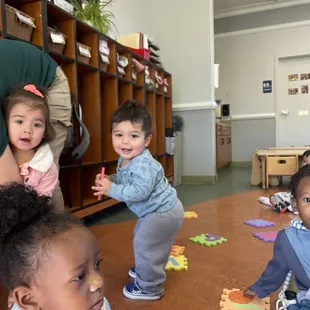 Singing and dancing with friends in his class