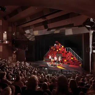 Scene from "Alice in Wonderland" from the McColl Family Theatre audience (1997)