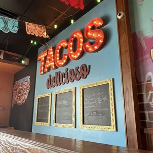 a taco&apos;s delitous sign in a mexican restaurant