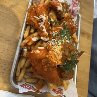 Buffalo wings over fries