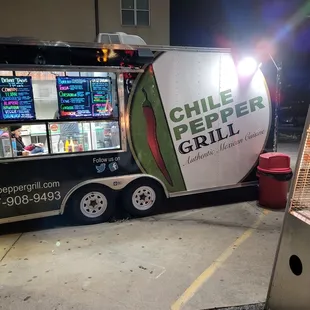 a food truck parked in a parking lot