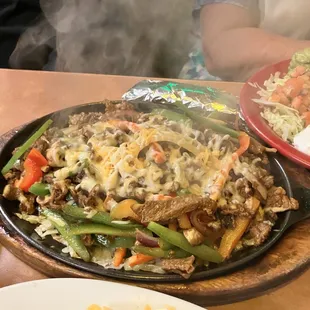 a large skillet of mexican food