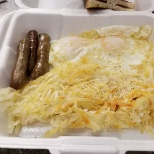 Two eggs, over medium w/sausage, hashbrowns and burned toast, $6.49.