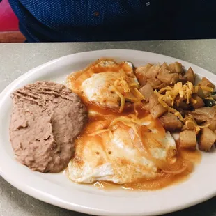 Huevos rancheros served with tortillas.