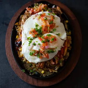 Three Sisters Skillet Hash 
shredded potatoes - queso salsa - red or green chile - eggs any style 
*available for brunch*