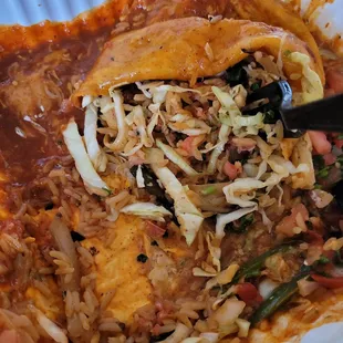 A huge burrito with 5 shrimp
