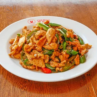 a plate of stir fried chicken