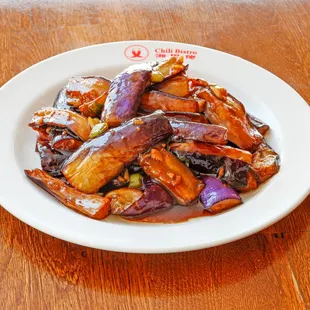 a plate of stir fried eggplant