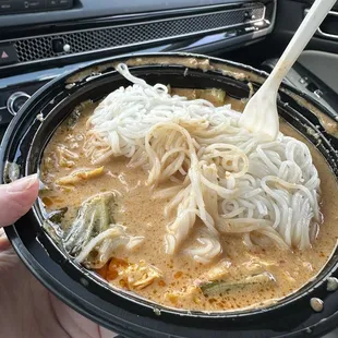 Mee goti moo with fresh rice noodles (a Thai curry)