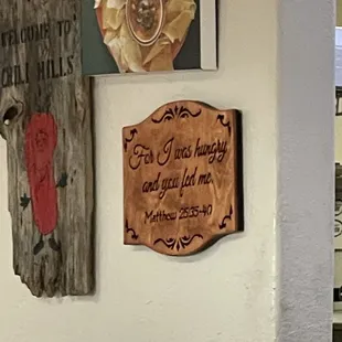 a sign on the wall of a restaurant