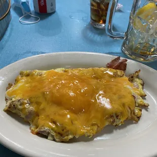 "Omelette" - I'm not sure this isn't just melted cheese and ham. Today, I learned you CAN have too much cheese.