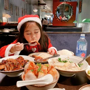 Little Santa is enjoying her meal at CHILI !