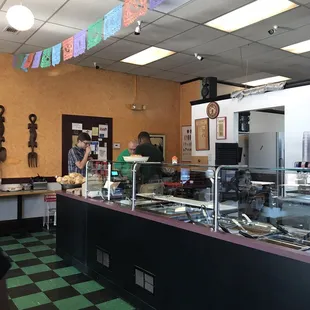 a restaurant with a checkered floor