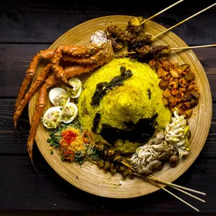 a plate of food on a wooden table