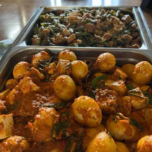 Sambal egg - hard boiled egg in spicy tomato sauce and Long beans &amp; Tempeh Tauco - long beans and tempeh in fermented bean sauce