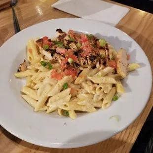 Cajun pasta was bland and undercooked.