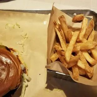 a tray of fries and a hamburger