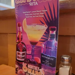 a sign for the grand sunset kita