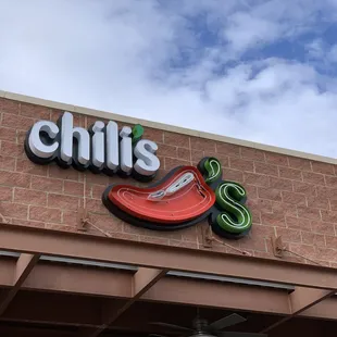 a sign on the side of a restaurant