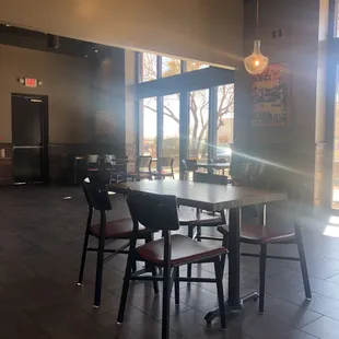 a table and chairs in a restaurant