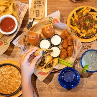 a table full of food and drinks